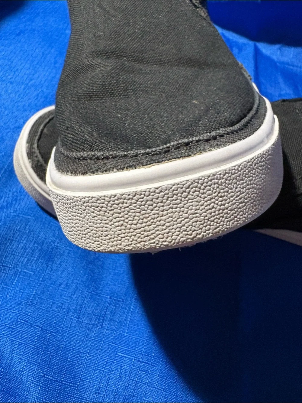 Nike Black Slip-On Canvas Sneakers with White Swoosh